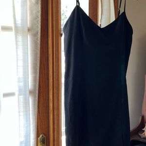 Forever 21 Little Black Dress. Material feels like Suede. Dress is Lined.